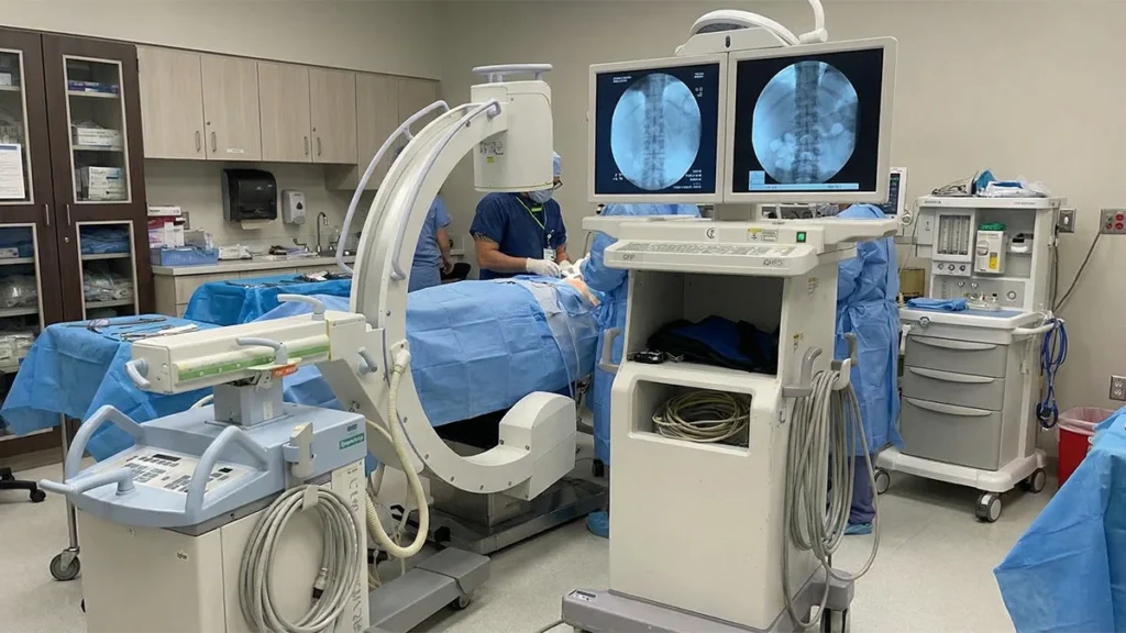 Portable digital X-ray system integrated into a Florida operating room, demonstrating professional imaging support during real surgical procedures.