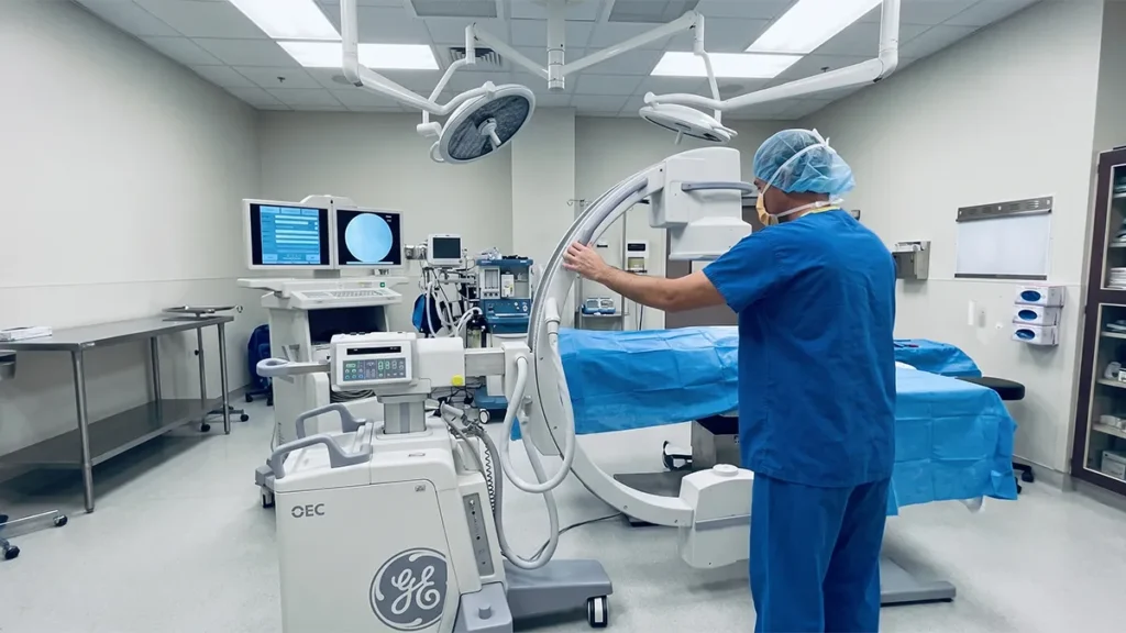 C-arm being set up during a procedure in a South Florida operating room