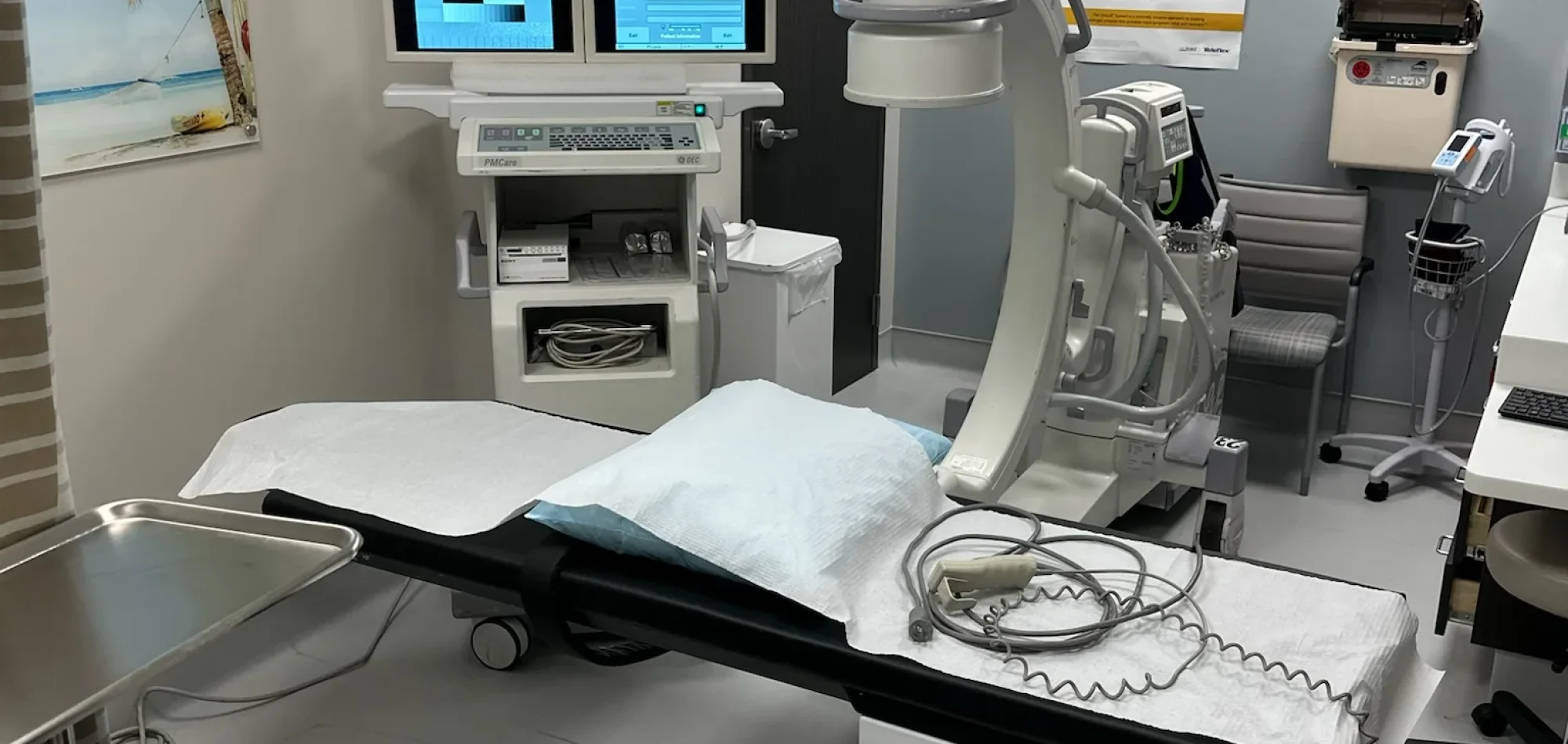 Mobile digital radiography machine delivered and fully set up in a Florida medical clinic procedure room, ready for immediate patient use.